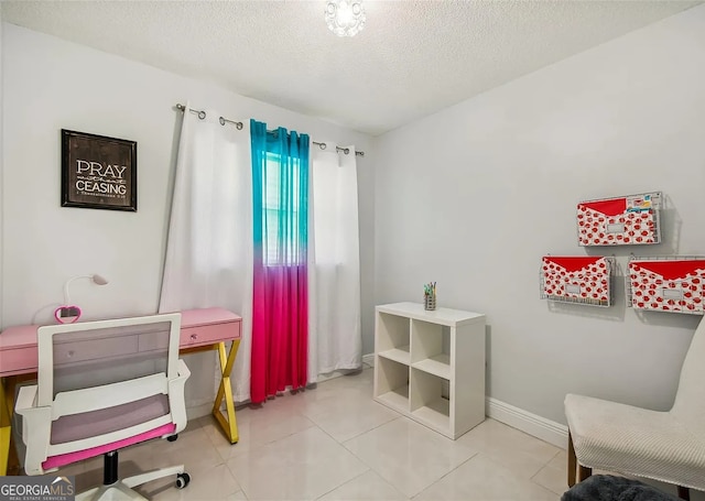 2917 W Clifton St, Tampa, FL 33614 - home office with a textured ceiling and tile patterned flooring
