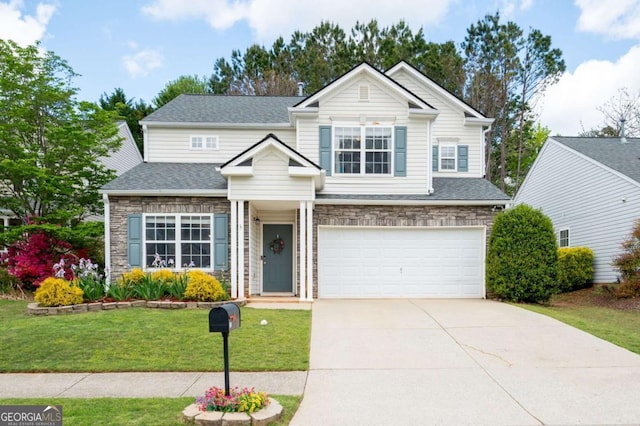 245 Weatherstone Pointe Dr, Woodstock, GA 30188 - view of front facade with an attached garage, concrete driveway, stone siding, and a front lawn