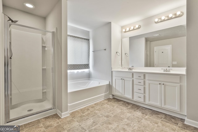 209 Merritt Cir, Newnan, GA 30263 - bathroom with double vanity, a shower stall, and a bath