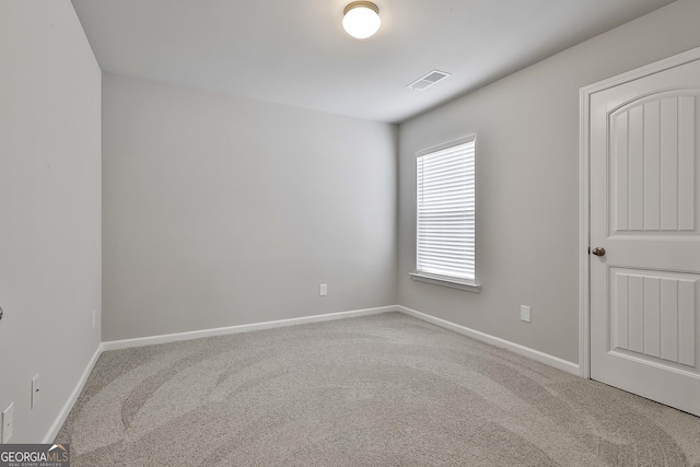 209 Merritt Cir, Newnan, GA 30263 - carpeted empty room featuring baseboards
