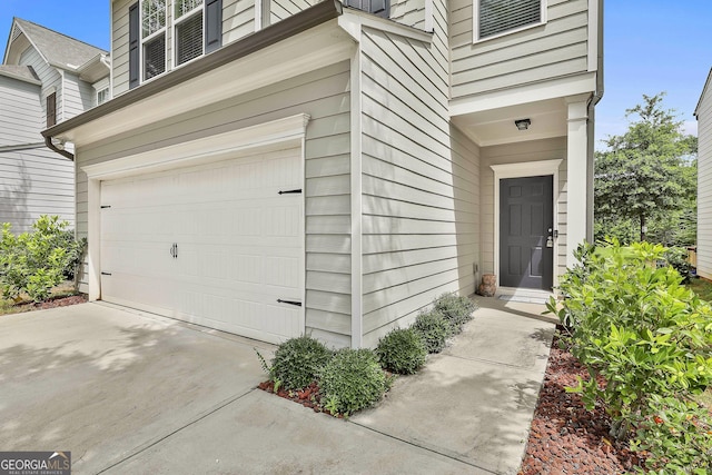 209 Merritt Cir, Newnan, GA 30263 - entrance to property with a garage and concrete driveway