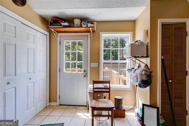 80 Jacob, Rockmart, GA 30153 - entryway featuring light tile patterned floors and baseboards