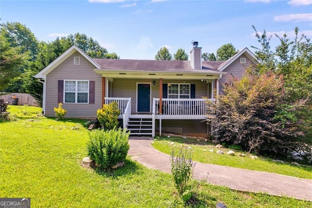 80 Jacob, Rockmart, GA 30153 - ranch-style home with covered porch, a chimney, and a front yard