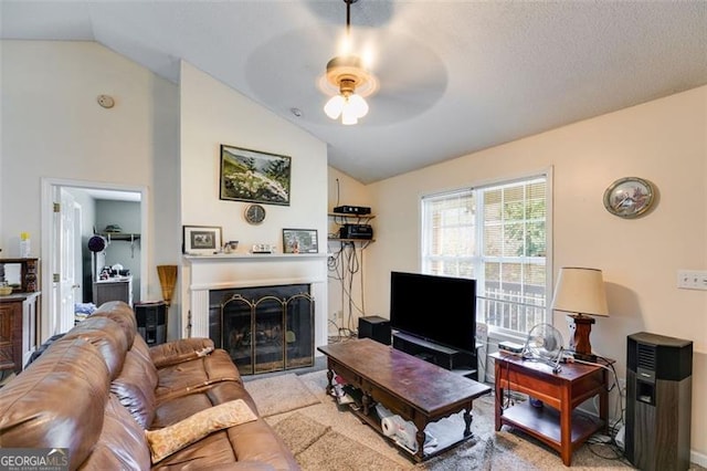 80 Jacob, Rockmart, GA 30153 - carpeted living area featuring vaulted ceiling, a ceiling fan, and a fireplace
