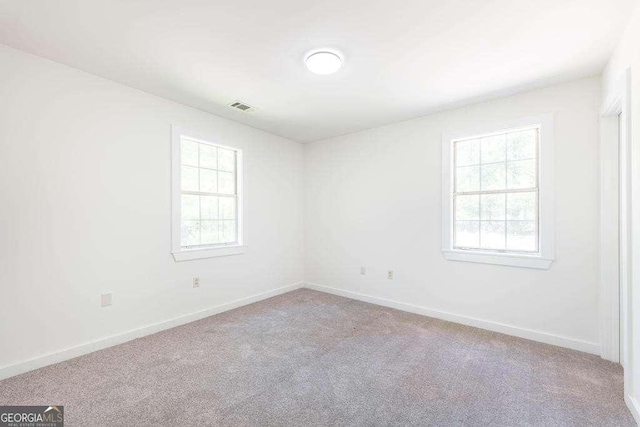 321 Riverbend Ct, Macon, GA 31211 - carpeted empty room featuring healthy amount of natural light