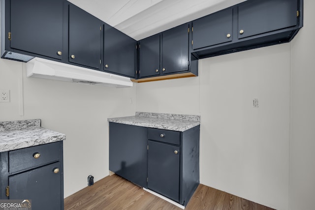 489 Berkeley Rd, Carlton, GA 30627 - laundry room featuring wood finished floors