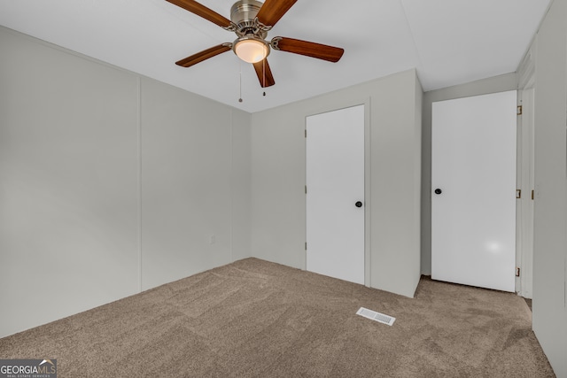 489 Berkeley Rd, Carlton, GA 30627 - unfurnished bedroom with carpet floors and ceiling fan