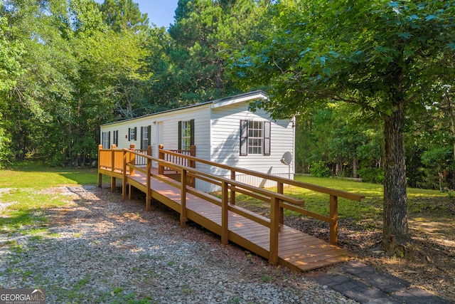 489 Berkeley Rd, Carlton, GA 30627 - manufactured / mobile home with a deck and a front yard
