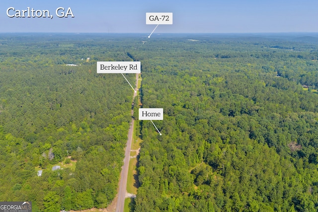 489 Berkeley Rd, Carlton, GA 30627 - aerial overview of property's location with a heavily wooded area and property boundaries highlighted