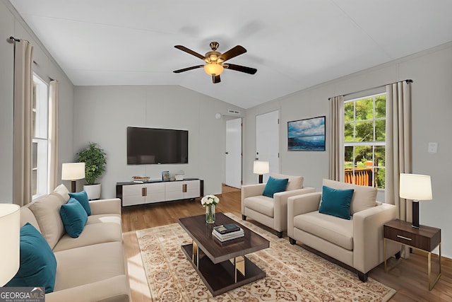 489 Berkeley Rd, Carlton, GA 30627 - living room with vaulted ceiling, wood finished floors, and a ceiling fan
