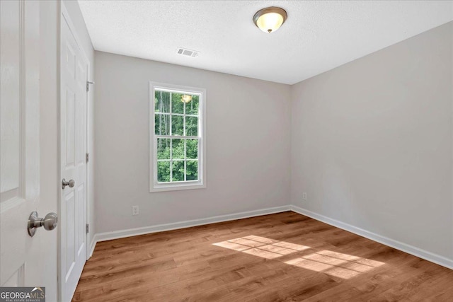 69 Southern Trace Way, Rockmart, GA 30153 - spare room with light wood-style floors and a textured ceiling