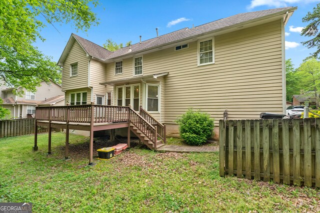 10044 Point View Dr, Jonesboro, GA 30238 - back of house with a wooden deck