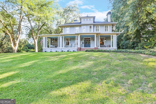 365 Seavy St, Senoia, GA 30276 - view of front facade with a porch, a chimney, and a front lawn