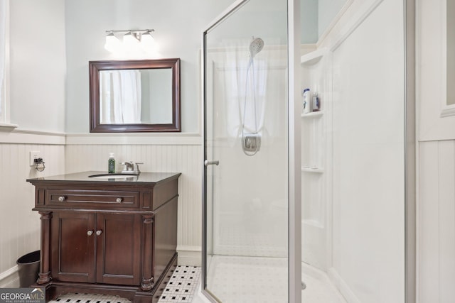 365 Seavy St, Senoia, GA 30276 - bathroom with a shower stall, vanity, and wainscoting