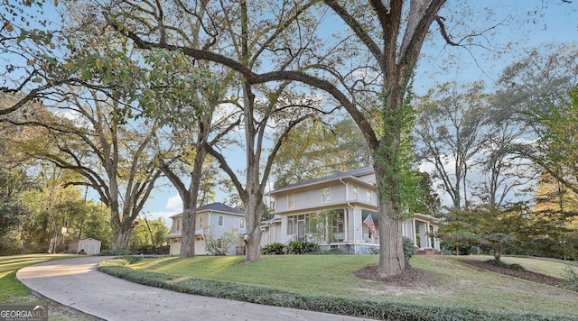 365 Seavy St, Senoia, GA 30276 - view of front facade featuring a shed and a front yard