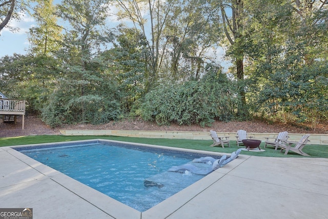 365 Seavy St, Senoia, GA 30276 - swimming pool with a patio, an outdoor fire pit, and a yard