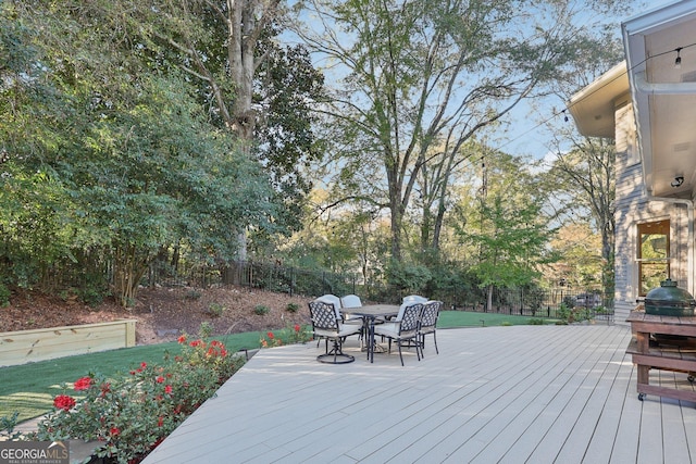 365 Seavy St, Senoia, GA 30276 - wooden deck featuring outdoor dining space and a fenced backyard