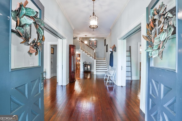 365 Seavy St, Senoia, GA 30276 - entryway with ornamental molding, wood-type flooring, a chandelier, and stairs