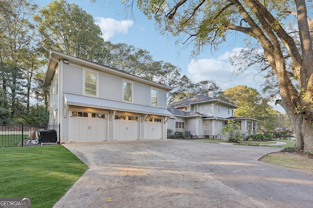 365 Seavy St, Senoia, GA 30276 - view of front facade with a garage and driveway