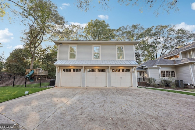 365 Seavy St, Senoia, GA 30276 - view of front of property with concrete driveway and a garage