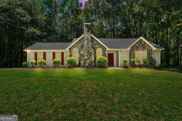 20 Four Oaks, Newnan, GA 30263 - ranch-style home featuring stone siding, a chimney, and a front lawn