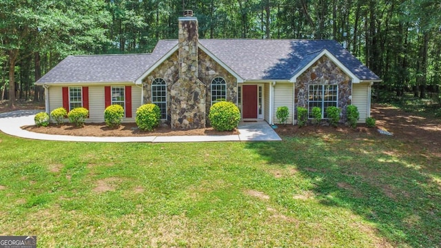 20 Four Oaks, Newnan, GA 30263 - ranch-style house featuring stone siding, a chimney, a front lawn, and roof with shingles