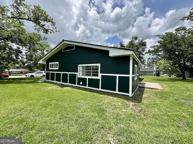 210 W Graham St, Mcrae-Helena, GA 31055 - back of house featuring a yard