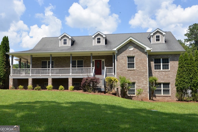 195 Twin Oaks Dr, Hampton, GA 30228 - view of front of property featuring brick siding, a front yard, and covered porch
