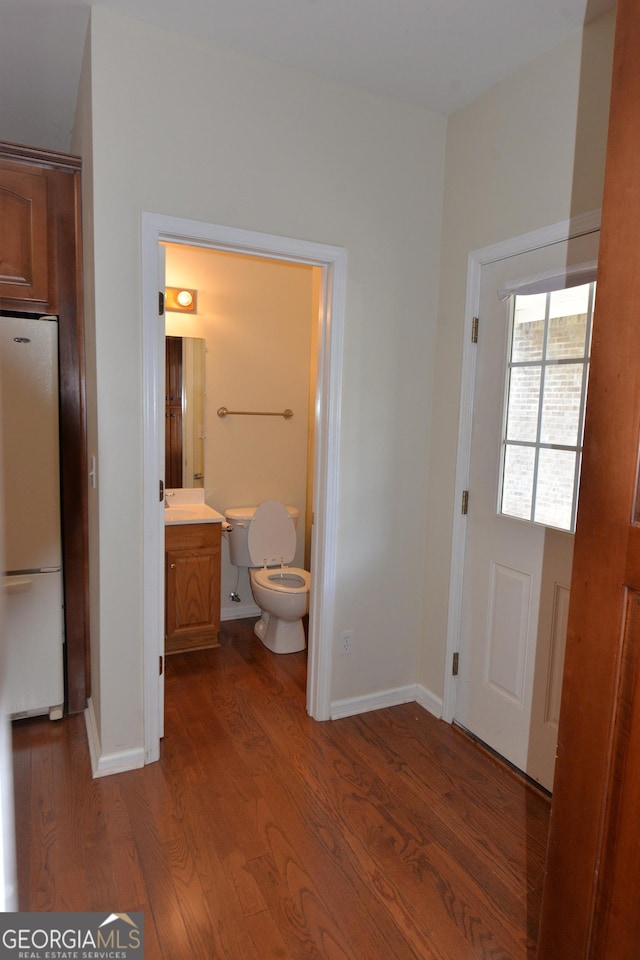 195 Twin Oaks Dr, Hampton, GA 30228 - half bathroom featuring wood finished floors and vanity