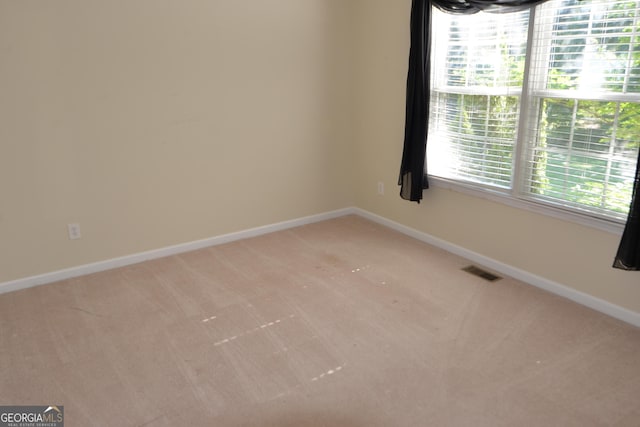 195 Twin Oaks Dr, Hampton, GA 30228 - empty room with light carpet and baseboards