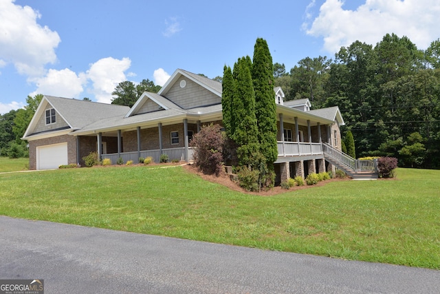 195 Twin Oaks Dr, Hampton, GA 30228 - farmhouse inspired home with a porch, a front yard, and a garage