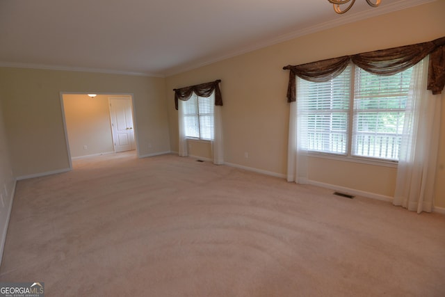 195 Twin Oaks Dr, Hampton, GA 30228 - spare room with crown molding, carpet flooring, and a chandelier