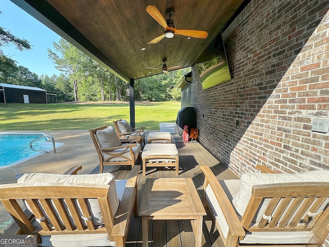 1501 E Main St, Hogansville, GA 30230 - view of patio / terrace featuring a ceiling fan, an outdoor hangout area, and an outdoor pool