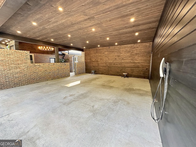 1501 E Main St, Hogansville, GA 30230 - unfurnished living room with unfinished concrete floors and wooden ceiling