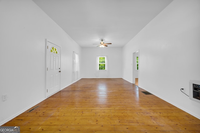 303 Oak Way Dr, Eastanollee, GA 30538 - unfurnished living room featuring a ceiling fan and light wood-style floors