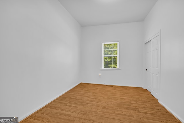 303 Oak Way Dr, Eastanollee, GA 30538 - unfurnished bedroom featuring light wood-style flooring