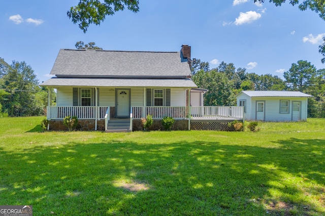 303 Oak Way Dr, Eastanollee, GA 30538 - view of front of home featuring a chimney, a front lawn, covered porch, and a garage