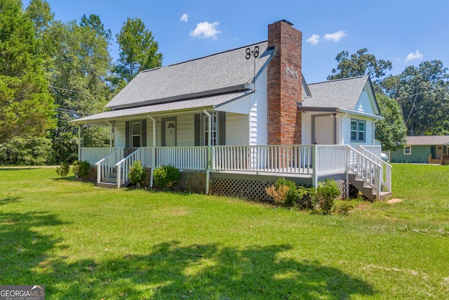 303 Oak Way Dr, Eastanollee, GA 30538 - view of front facade with a porch, a shingled roof, a chimney, and a front lawn
