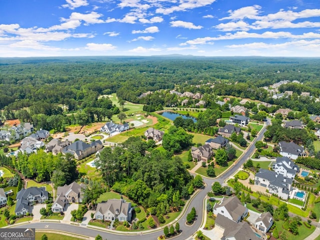 5021 Kings Close, Alpharetta, GA 30004 - aerial perspective of suburban area with a heavily wooded area and a nearby body of water