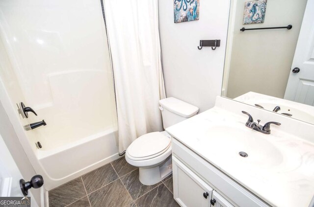 2436 Loughridge Dr, Buford, GA 30519 - bathroom featuring vanity and shower / tub combo with curtain