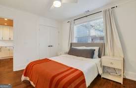 1016 Seiler Ave, Savannah, GA 31401 - bedroom featuring dark wood-style floors, a closet, and ceiling fan
