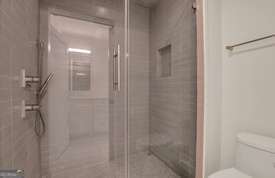 1016 Seiler Ave, Savannah, GA 31401 - bathroom with toilet and a stall shower
