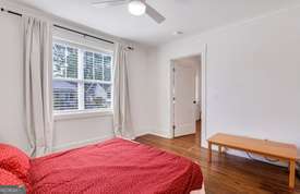 1016 Seiler Ave, Savannah, GA 31401 - bedroom with wood finished floors and ceiling fan