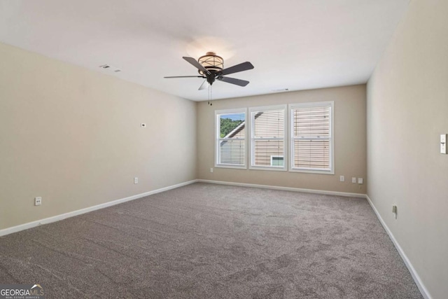 1755 Rutland Pass Dr, Lawrenceville, GA 30045 - carpeted spare room featuring ceiling fan and baseboards