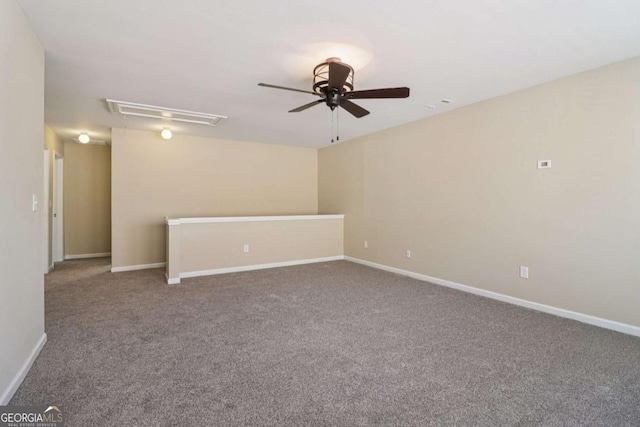 1755 Rutland Pass Dr, Lawrenceville, GA 30045 - empty room featuring attic access, a ceiling fan, and carpet
