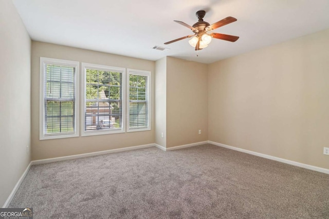1755 Rutland Pass Dr, Lawrenceville, GA 30045 - spare room with carpet flooring and a ceiling fan