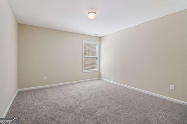 1755 Rutland Pass Dr, Lawrenceville, GA 30045 - spare room featuring carpet floors and baseboards
