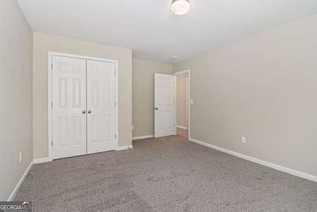 1755 Rutland Pass Dr, Lawrenceville, GA 30045 - unfurnished bedroom with carpet and a closet