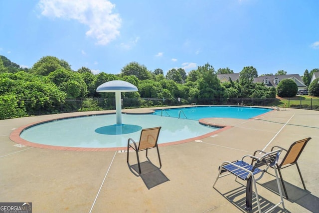 1755 Rutland Pass Dr, Lawrenceville, GA 30045 - community pool featuring a patio area