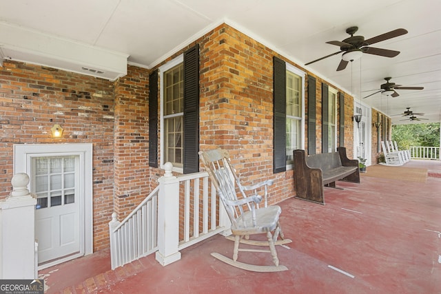 2540 Sugar Hill Rd, Unadilla, GA 31091 - covered porch featuring ceiling fan